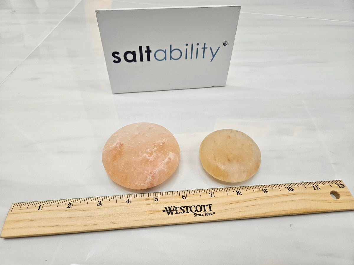 Himalayan salt stones worn down after use for massage
